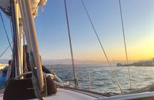 Lisbon sunset sail with drinks and snacks
