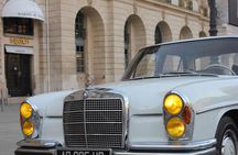 Guided tour of Paris in a collection car with wine tasting