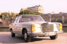 Guided tour of Paris in a collection car with wine tasting