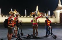 Guided e-scooter night tour with local street food