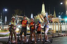 Guided e-scooter night tour with local street food