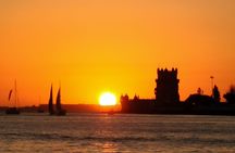 Small-group Lisbon sunset sailing cruise with a welcome drink
