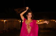 Abu Dhabi desert safari with BBQ, camel ride and sandboarding