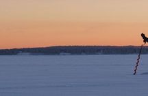 Guided ice fishing experience in Luleå