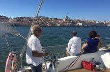 Lisbon old town sailing cruise with a welcome drink