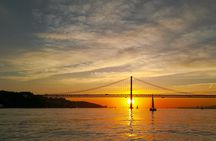Small-group Lisbon sunset sailing cruise with a welcome drink