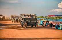 Exploration of floating village by 4x4 and sunset boat tour