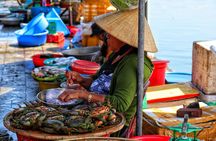Hoi An sunset river cruise and rowing basket boat