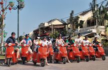 Hoi An private evening food tour by electric scooter