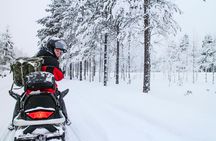 Saariselka full-day snowmobile safari with ice fishing