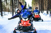 Saariselka full-day snowmobile safari with ice fishing