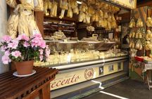 Walking tour with Tiber cruise and Trastevere food tasting