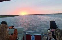 Ria Formosa and Faro Islands catamaran guided tour from Faro at sunset