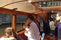 Early morning Amsterdam canals boat tour