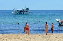 Guided boat trip with extra swimming time and beach BBQ from Albufeira