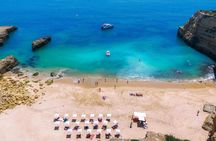 Guided boat trip with extra swimming time and beach BBQ from Albufeira