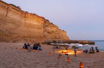 Sunset guided boat trip with secluded beach BBQ from Albufeira