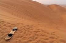 Sandboarding and secret paradise valley full-day tour with pickup