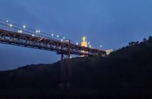 Tagus river night cruise with glass of champagne