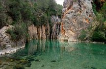 Natural thermal springs and Girlfriend Waterfall tour from Valencia
