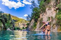 Natural thermal springs and Girlfriend Waterfall tour from Valencia