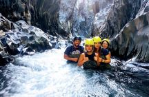 River trekking guided experience in the Alcantara Gorges