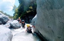 River trekking guided experience in the Alcantara Gorges