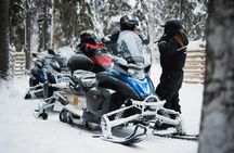 Reindeer and husky farm tour with snowmobiling