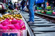 Damnoen Saduak floating market and Maeklong railway guided tour