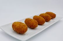 Tapas cooking experience at a private eatery in Madrid