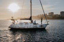 Sailboat cruise on the Douro River at sunset