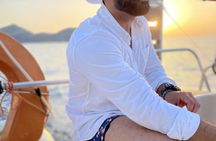 Milos sunset catamaran to Kleftiko with appetizers and drinks