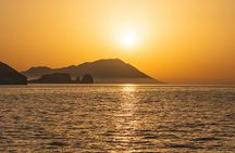 Milos sunset catamaran to Kleftiko with appetizers and drinks