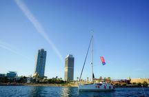 Helicopter Flight and Sailing Experience in Barcelona