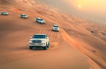 Dubai desert safari with dune bashing, sand boarding, BBQ dinner