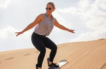Dubai desert safari with dune bashing, sand boarding, BBQ dinner
