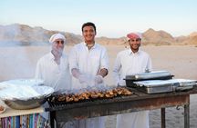 Quad sunset with barbecue and camel riding in Marsa Alam
