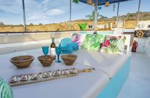 Sunset Boat Tour with Tapas, Open Bar and Water Sports in Ibiza