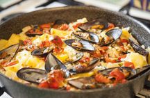 Market tour and dining experience at a Cesarina's home at Como