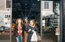 Market tour and dining experience at a Cesarina's home in Modena