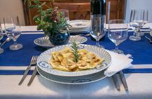 Market tour and dining experience at a Cesarina's home in Turin