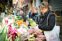 Market tour, lunch or dinner and show cooking at a Cesarina's home in Bologna