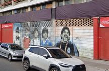 Messi and Maradona Argentine football legends graffiti tour