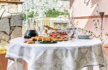 Market visit and cooking class at a Cesarina's home at Como