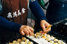 Traditional Japanese guided food tour in Osaka