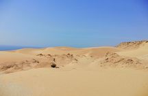 Sandboarding and secret paradise valley full-day tour with pickup