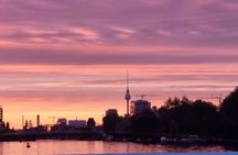 Solar-powered catamaran cruise on Berlin's Spree River at sunset