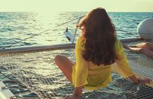 Half-Day Mykonos, Delos and Rhenia Catamaran Cruise with Lunch
