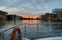 Solar-powered catamaran cruise on Berlin's Spree River at sunset