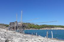 Gargano coast guided boat trip with caves, bays, and tradition